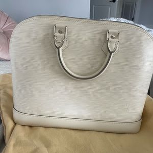 Louis Vuitton Alma epi leather bag